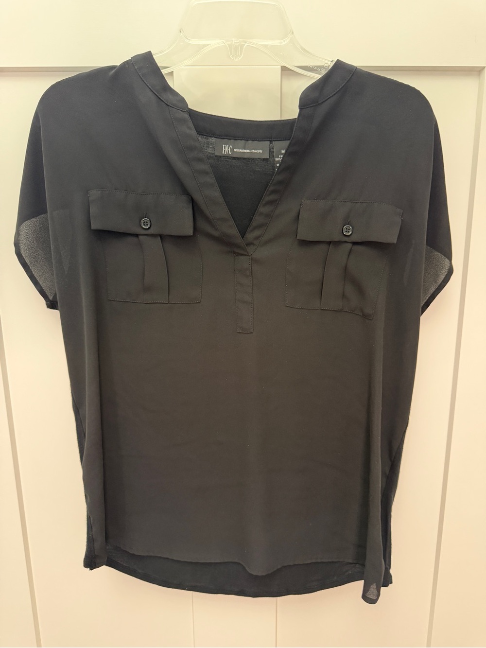 INC sleeveless black top